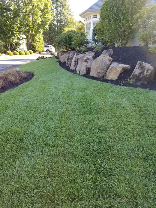 Landscape installation or grounds maintenance by Earthworks Landscape Service
