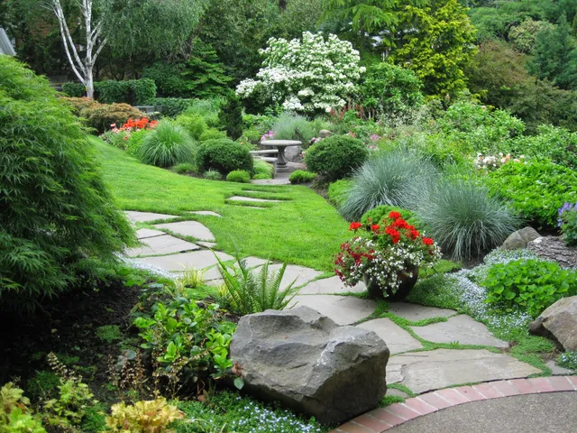 Flagstone path and healthy planting beds in a residential garden